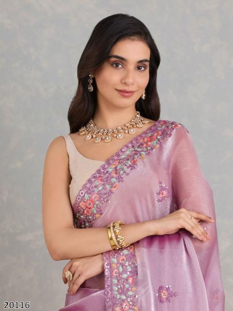 “Traditional pink saree and white blouse set for festivals and weddings”