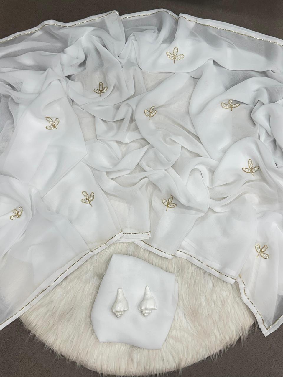 Elegant Handcrafted Leaf-Cut Georgette Saree with Silver Embellished Border