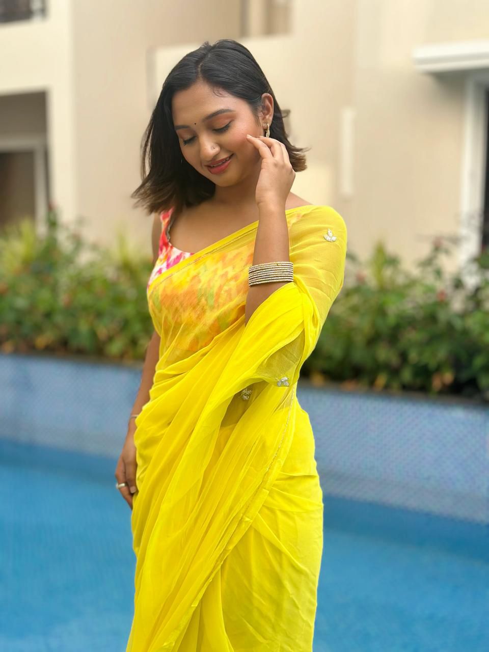 Elegant Handcrafted Leaf-Cut Georgette Saree with Silver Embellished Border