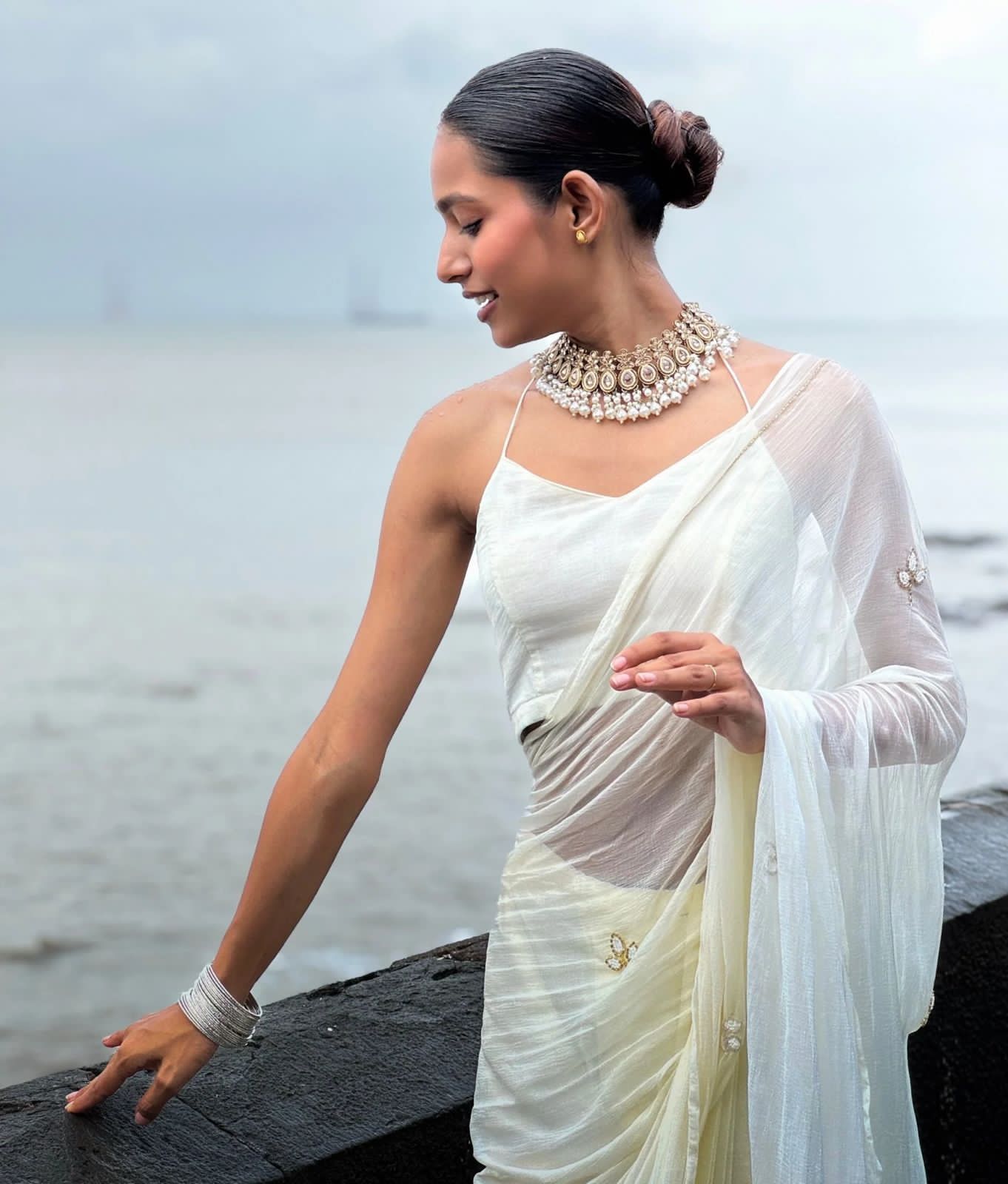 Elegant Handcrafted Leaf-Cut Georgette Saree with Silver Embellished Border