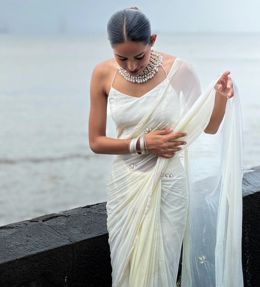 Elegant Handcrafted Leaf-Cut Georgette Saree with Silver Embellished Border