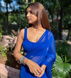 Elegant Handcrafted Leaf-Cut Georgette Saree with Silver Embellished Border